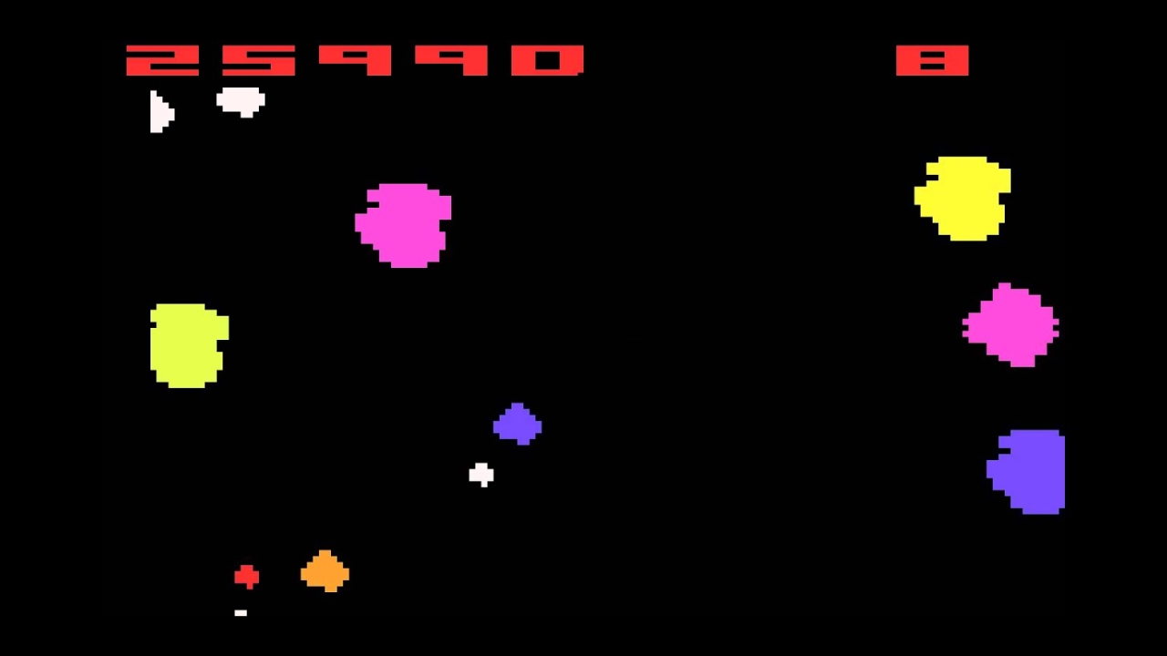 Asteroids gameplay screenshot from the Atari 2600 console.