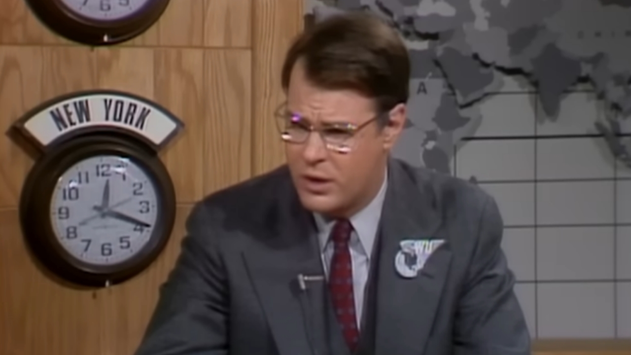 On this edition of "Point/Counterpoint," Dan Aykroyd and Jane Curtin debate Lee Marvin and Michelle Triola's relationship. [Season 04, 1979]