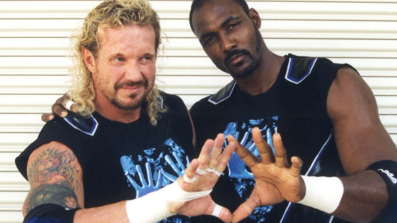 Diamond Dallas Page and his one-time tag team partner Karl Malone in 1998.