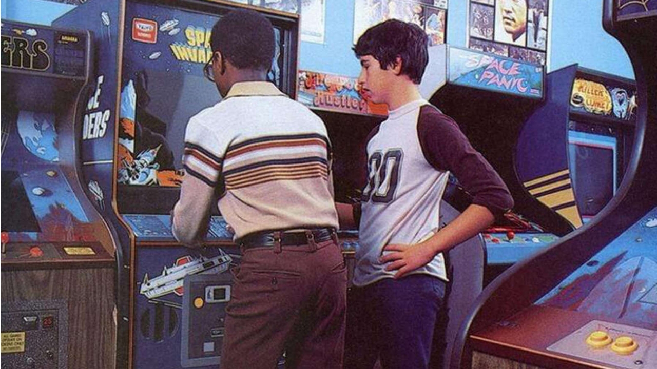 Two Kids Playing Space Invaders