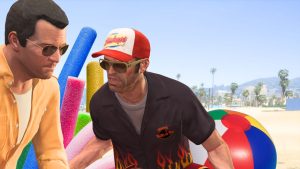 'Grand Theft Auto V' characters Michael De Santa and Trevor Philips converse on Vespucci Beach. Pool toys superimposed behind them.
