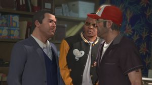 Screenshot from Rockstar Games' 'Grand Theft Auto V Enhanced' (2022) shows trio of protagonists (from L to R): Michael De Santa, Franklin Clinton, and Trevor Philips.