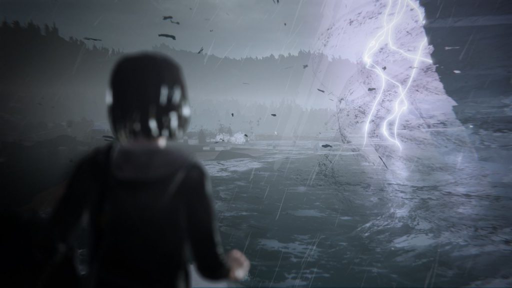 'Life is Strange' protagonist Max Caulfield (foreground-left) observes powerful storm in distance