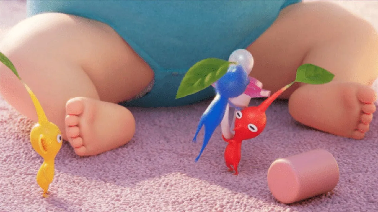 Still image from 'Close to You' (Nintendo) shows three Pikmin in front of a sitting baby, | Outrun Gaming