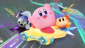 Kirby, Meta Knight, and Bandana Waddle-Dee pose in front of track seen in 'Kirby Air Riders.' (Outrun Gaming: Everything you missed from the second 'Kirby Air Riders' Nintendo Direct)
