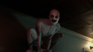 Screenshot from 'The Mortuary Assistant' shows frightening figure perched above.
