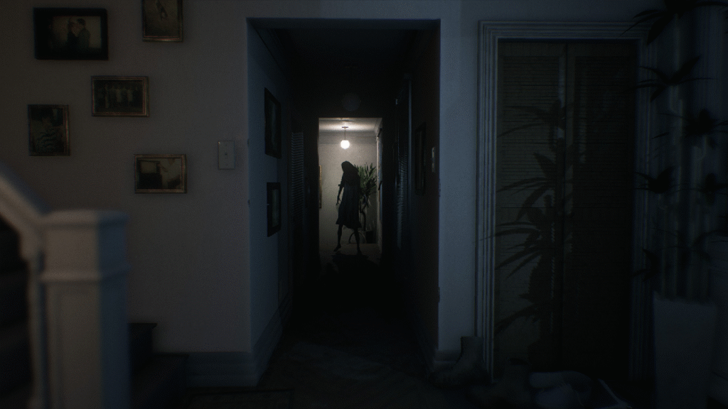 Image from 'Visage' (2020) shows haunting, contorted figure standing at the end of dark hallway.