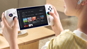 Woman wears wireless earbud headphones, plays Asus ROG Xbox Ally handheld PC.